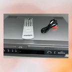Sony Hi-Fi stereo system with remote control and cables on a light gray background