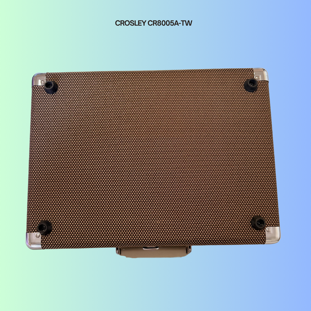 Bottom of a Crosley CR8005A-TW portable turntable. Shows rubber feet to prevent turntable from gliding.