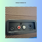 Back panel of a Crosley record player with audio connectors on a gradient background