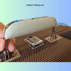 Close-up of a Crosley CR8005A-TW suitcase handle with minor cosmetic wear.